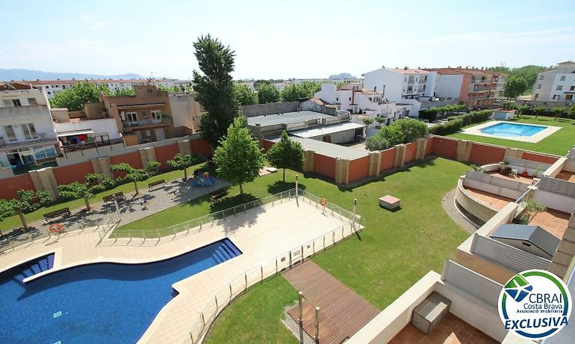 PUIG ROM  Apartment with community pool, parking and solarium
